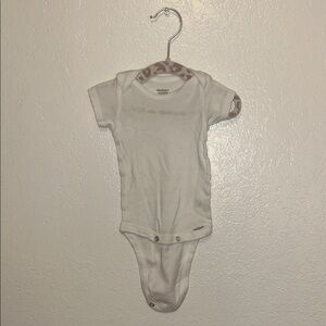 White Baby Onesie with Patterned Trim